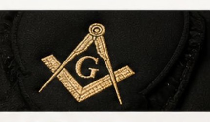 Gold masonic embroidery detail on ceremonial fabric